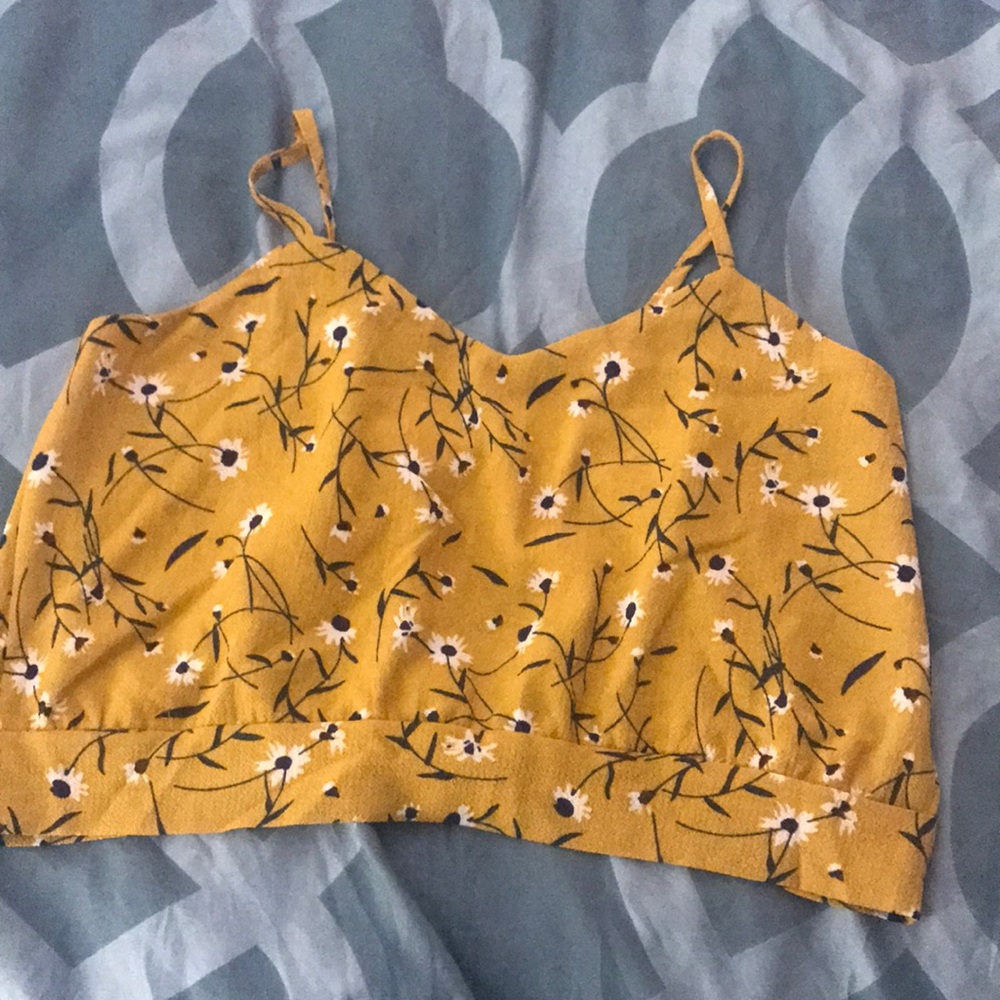 Midriff top with semi open back.